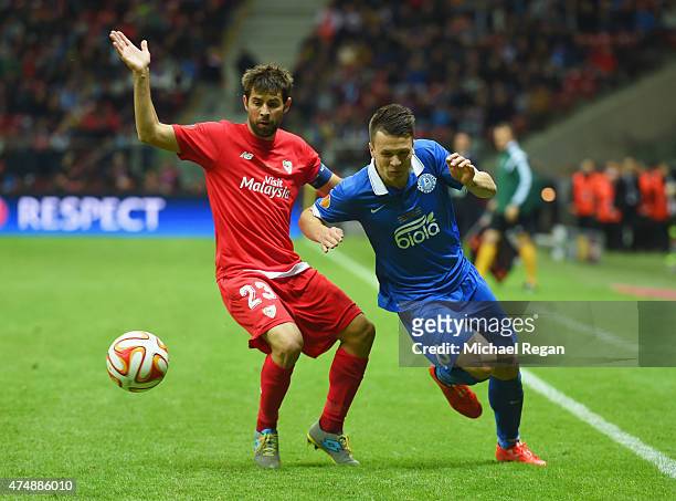 Yevhen Konoplyanka of Dnipro evades Coke of Sevilla during the UEFA Europa League Final match between FC Dnipro Dnipropetrovsk and FC Sevilla on May...