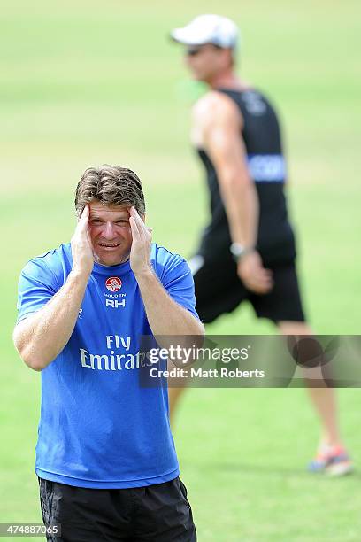 Magpies assistant coach Robert Harvey looks on during a Collingwood Magpies AFL training session at the Southport Football Club on February 26, 2014...