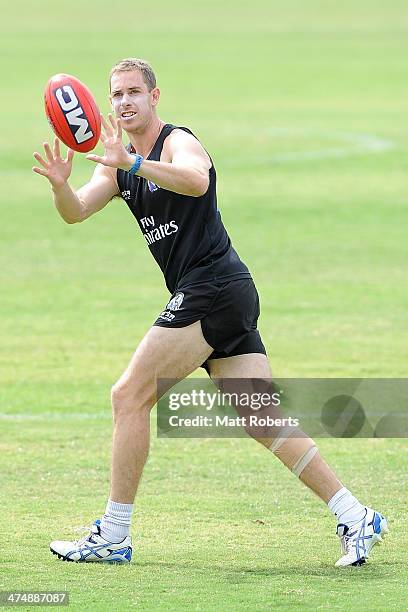 Nick Maxwell marks the ball during a Collingwood Magpies AFL training session at the Southport Football Club on February 26, 2014 on the Gold Coast,...