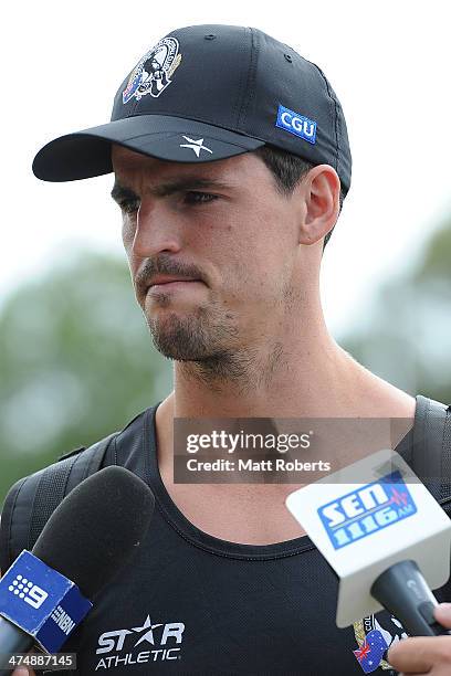 Scott Pendlebury speaks to media representatives before a Collingwood Magpies AFL training session at the Southport Football Club on February 26,...