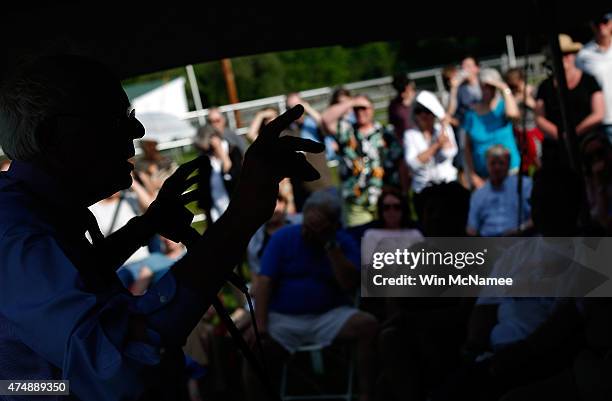 Democratic presidential candidate and U.S. Sen. Bernie Sanders speaks to supporters at a house party campaign event at the home of Kathryn Williams...