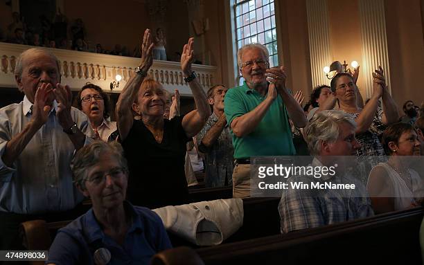 Democratic presidential candidate and U.S. Sen. Bernie Sanders receives a standing ovation while speaking at a town meeting at the South Church May...