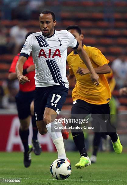 Andros Townsend of Tottenham Hotspur runs with the ball during the pre-season friendly match between Malaysia XI and Tottenham Hotspur at Shah Alam...