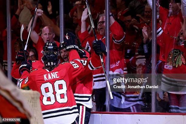 Brandon Saad of the Chicago Blackhawks celebrates a second period goal with teammates against the Anaheim Ducks in Game Six of the Western Conference...