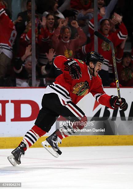 Andrew Shaw of the Chicago Blackhawks celebrates a third period goal against the Anaheim Ducks in Game Six of the Western Conference Finals during...