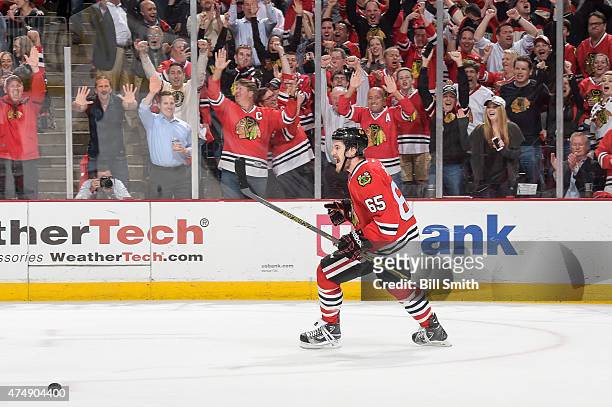 Andrew Shaw of the Chicago Blackhawks reacts after scoring an empty-net goal against the Anaheim Ducks in the third period in Game Six of the Western...