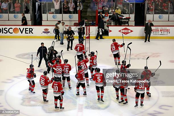 The Chicago Blackhawks salute the crowd after defeating the Anaheim Ducks 5-2 in Game Six of the Western Conference Finals during the 2015 NHL...