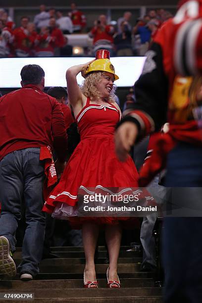 A Chicago Blackhawks fan cheers at the end of Game Six of the Western Conference Finals against the Anaheim Ducks during the 2015 NHL Stanley Cup...