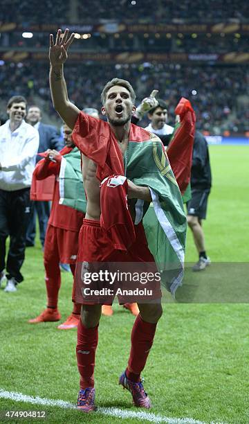 Members of Sevilla celebrate their victory as they won UEFA Europa League trophy after the UEFA Europa League Final match between FC Dnipro...