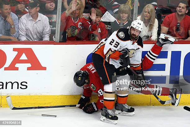 Francois Beauchemin of the Anaheim Ducks checks Patrick Kane of the Chicago Blackhawks in Game Six of the Western Conference Finals during the 2015...