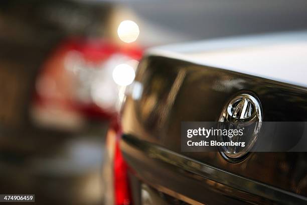Totota Motor Corp. Badge sits on the rear of a Toyota Corolla GLi automobile assembled at the company's Pakistan affiliate Indus Motor Co.'s plant in...