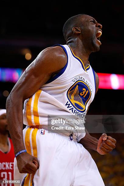 Festus Ezeli of the Golden State Warriors reacts in the fourth quarter while taking on the Houston Rockets during game five of the Western Conference...
