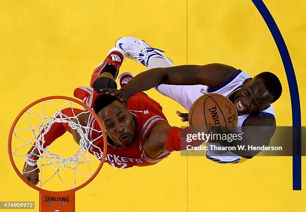 Dwight Howard of the Houston Rockets and Draymond Green of the Golden State Warriors go after the ball during game five of the Western Conference...