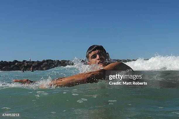 Marley Williams swims during a Collingwood Magpies AFL beach session at the Southport Spit on February 26, 2014 on the Gold Coast, Australia.