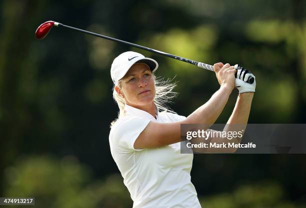 Suzann Pettersen of Norway hits an approach shot on the seventh hole during the Pro Am event prior to the start of the HSBC Women's Champions at the...