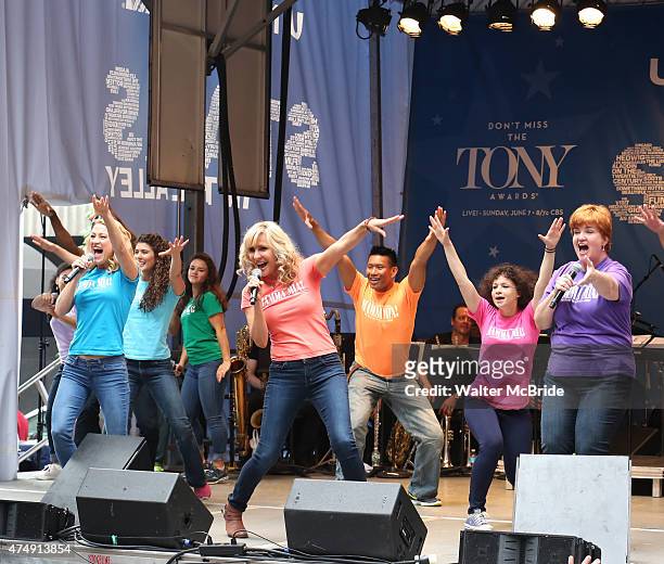 The cast of 'Mamma, Mia!' performs at United presents 'Stars in the Alley' in Shubert Alley on May 27, 2015 in New York City.