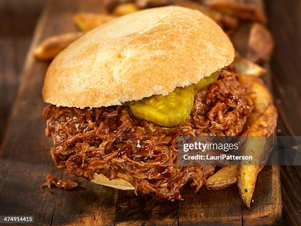 pulled pork sandwich - pulled beef stock pictures, royalty-free photos & images