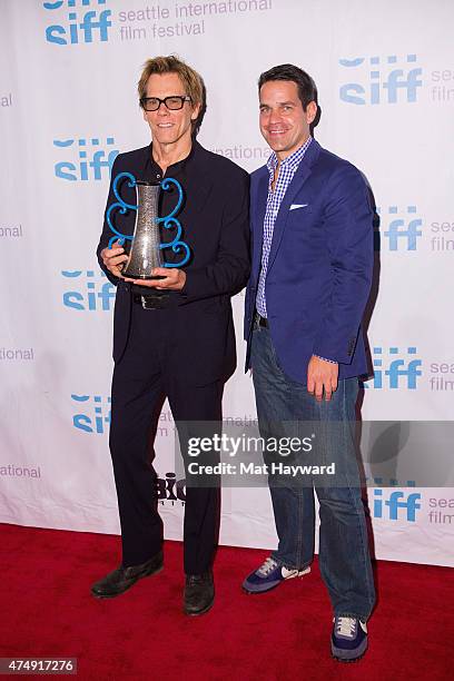 Actor Kevin Bacon and chief correspondent for Fandango Dave Karger pose for a photo with the Seattle International Film Festival Career Achievement...