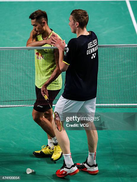 Viktor Axelsen of Denmark shakes hands with Lin Dan of China after winning in the Men's Singles match on day two of 2015 the Star Australian...