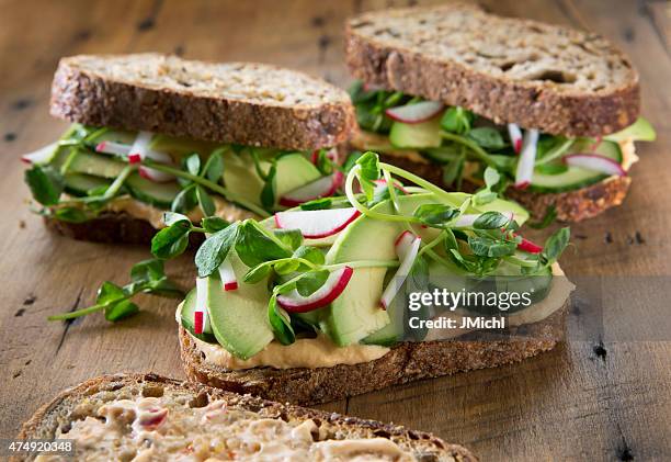 vegetable sandwich's on a rustic wood background. - sandwich stock pictures, royalty-free photos & images