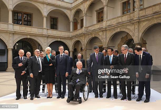 German Finance Minister Wolfgang Schaeuble arrives for the group photo of finance ministers, central bank governors, and global financial institution...