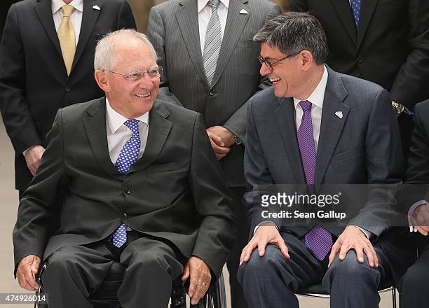 German Finance Minister Wolfgang Schaeuble and U.S. Secretary of the Treasury Jacob Lew arrive for the group photo of finance ministers, central bank...