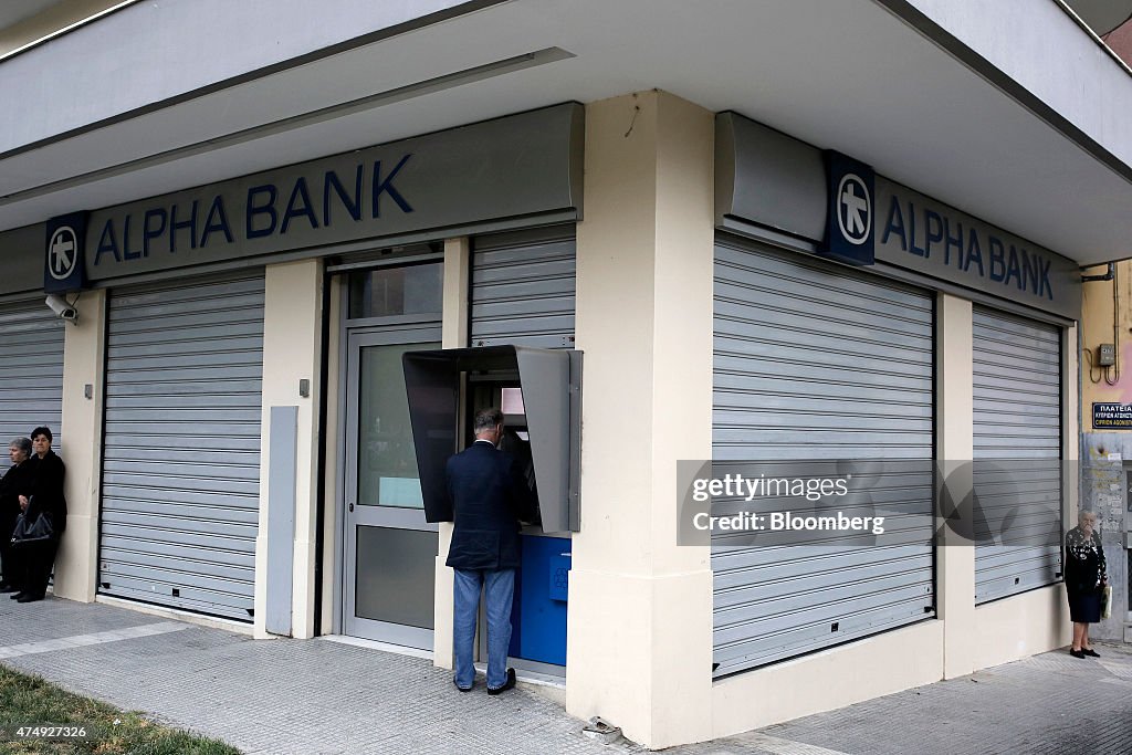 Pensioners And Greek Banks Amid Record Deposit Outflows