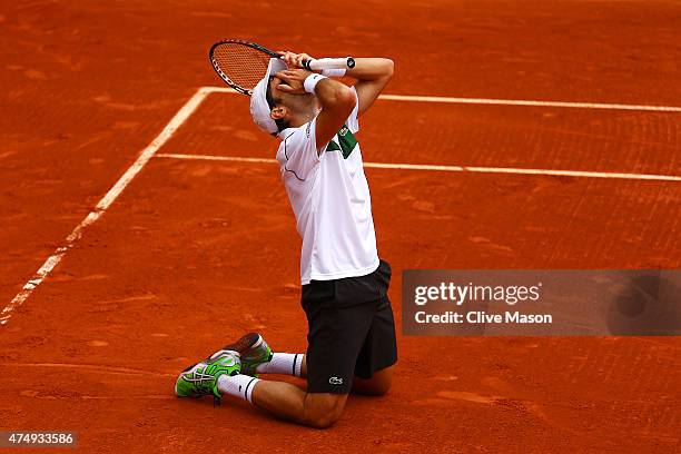 Pablo Andujar of Spain celebrates victory in his men's singles match against Philipp Kohlschreiber of Germany on day five of the 2015 French Open at...