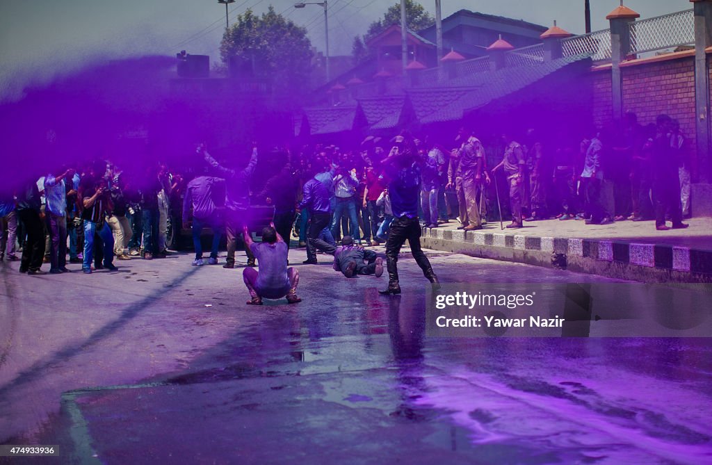 Indian Police Used Chemical Dyed Purple Water To Disperse Kashmir Employees