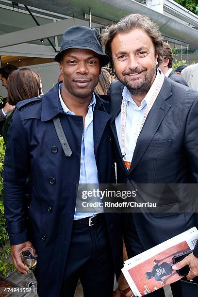 Football Player Sylvain Wiltord and Tennis Player Henri Leconte attend the 2015 Roland Garros French Tennis Open - Day Five, on May 28, 2015 in...
