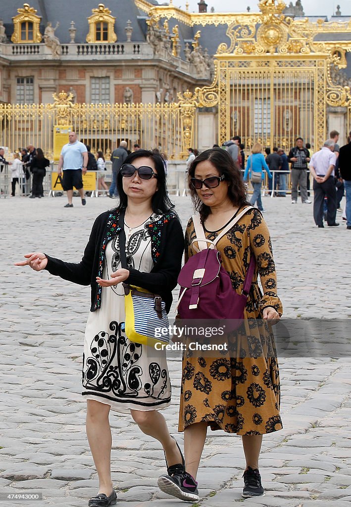 Asian Tourists Visiting Versailles