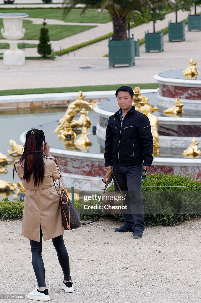 Asian Tourists Visiting Versailles