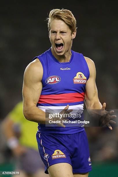 Lachie Hunter of the Bulldogs reacts after missing a goal during the round three AFL NAB Challenge match between the Western Bulldogs and the...