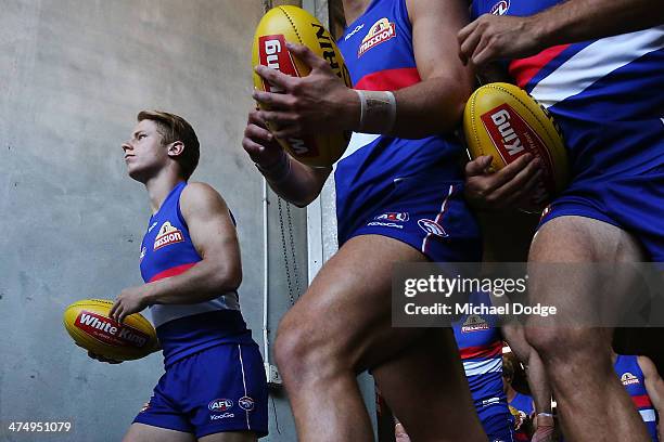 Lachie Hunter of the Bulldogs walks out to the ground during the round three AFL NAB Challenge match between the Western Bulldogs and the Fremantle...