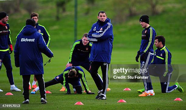 Sunderland manager Gus Poyet looks on during Sunderland training ahead of sunday's Capital One Cup Final against Manchester City at the Academy of...