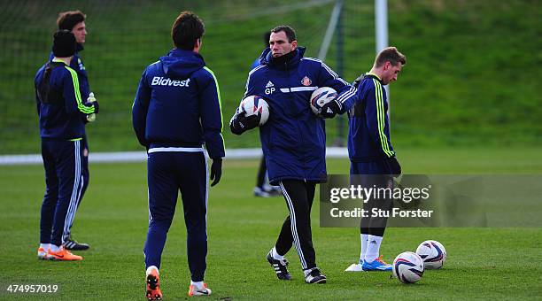 Sunderland manager Gus Poyet looks on during Sunderland training ahead of sunday's Capital One Cup Final against Manchester City at the Academy of...