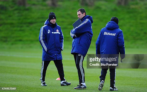 Sunderland manager Gus Poyet looks on during Sunderland training ahead of sunday's Capital One Cup Final against Manchester City at the Academy of...