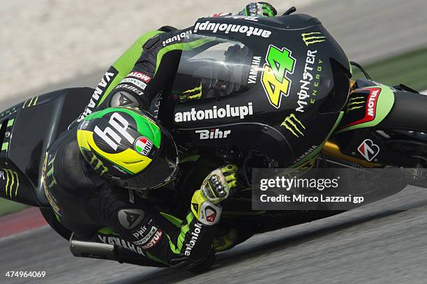 Pol Espargaro of Spain and Monster Yamaha Tech 3 rounds the bend during the MotoGP Tests in Sepang - Day One at Sepang Circuit on February 26, 2014...