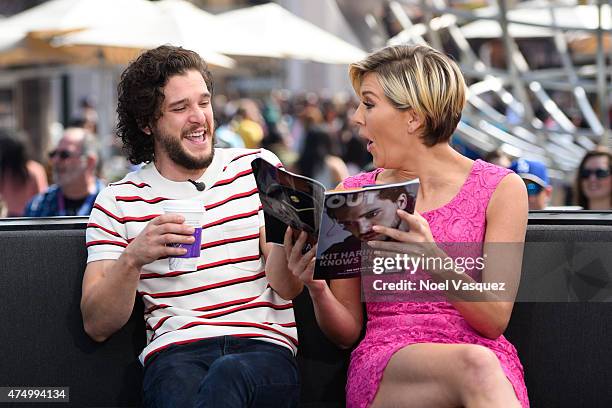 Kit Harington and Charissa Thompson visit "Extra" at Universal Studios Hollywood on May 28, 2015 in Universal City, California.