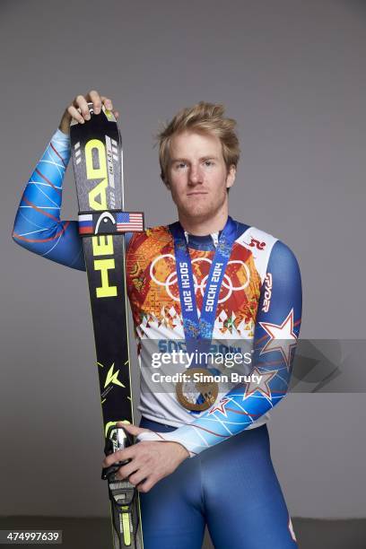 Winter Olympics: Portrait of USA Ted Ligety posing with gold medal for winning Men's Giant Slalom during photo shoot at Main Media Center. Sochi,...