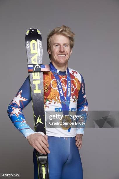 Winter Olympics: Portrait of USA Ted Ligety posing with gold medal for winning Men's Giant Slalom during photo shoot at Main Media Center. Sochi,...