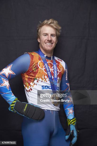 Winter Olympics: Portrait of USA Ted Ligety posing with gold medal for winning Men's Giant Slalom during photo shoot at Main Media Center. Sochi,...