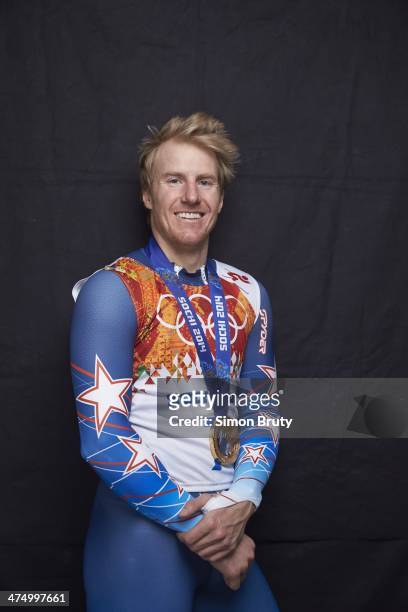 Winter Olympics: Portrait of USA Ted Ligety posing with gold medal for winning Men's Giant Slalom during photo shoot at Main Media Center. Sochi,...