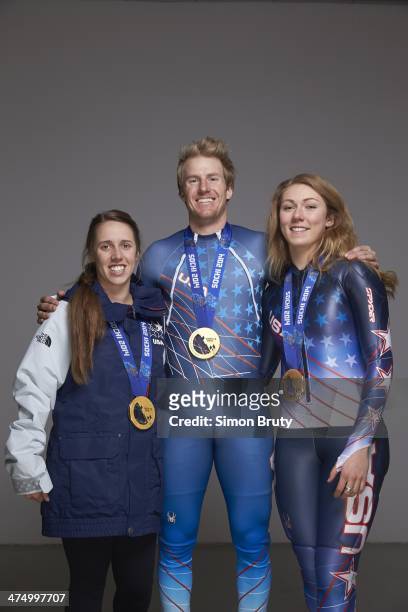 Winter Olympics: Portrait of USA freestyle skiier Maddie Bowman , alpine skiiers Mikaela Shiffrin and Ted Ligety posing with gold medals during photo...