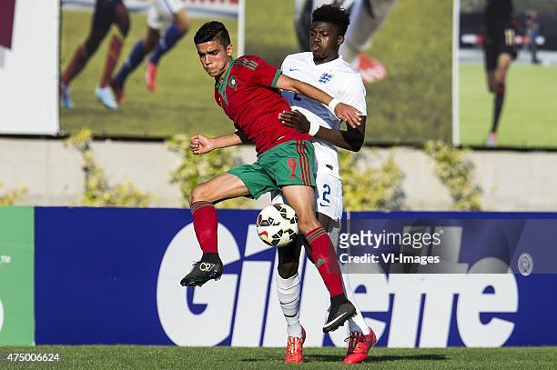 Achraf Bencharki of Morocco U21, Dominic Iorfa of England U21 during the Festival International Espoirs de Football tournament match between...