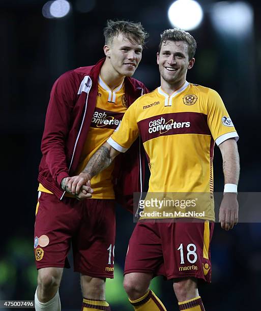 Lee Erwin and Josh Law of Motherwell celebrate at full time during the Scottish Premiership play off final, first leg match between Rangers and...