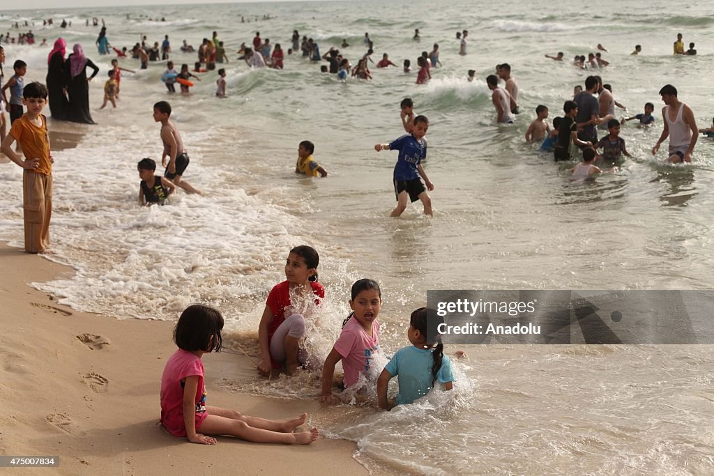 People enjoy a sunny day in Gaza