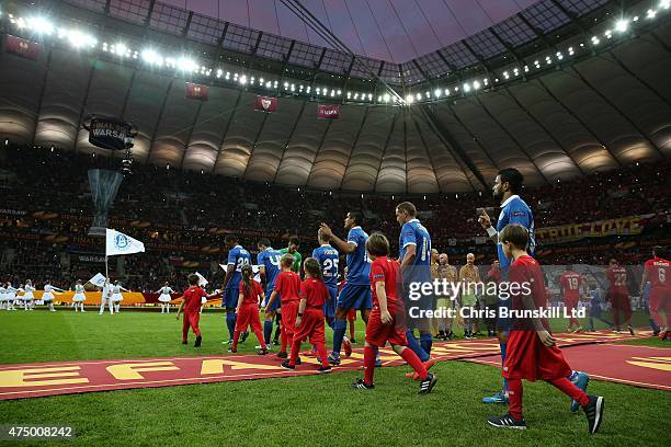 The two teams walk out ahead of the UEFA Europa League Final match between FC Dnipro Dnipropetrovsk and FC Sevilla at the National Stadium on May 27,...