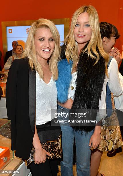 Ashley Roberts and Laura Whitmore attend the launch of the New Folli Follie Flagship Store on Oxford Street on May 28, 2015 in London, England.