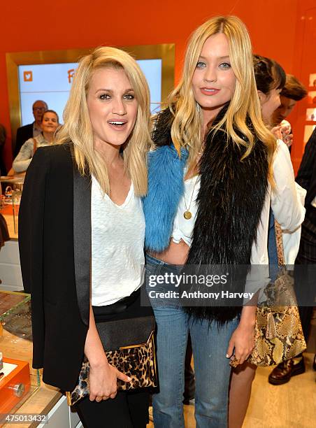 Ashley Roberts and Laura Whitmore attend the launch of the New Folli Follie Flagship Store on Oxford Street on May 28, 2015 in London, England.